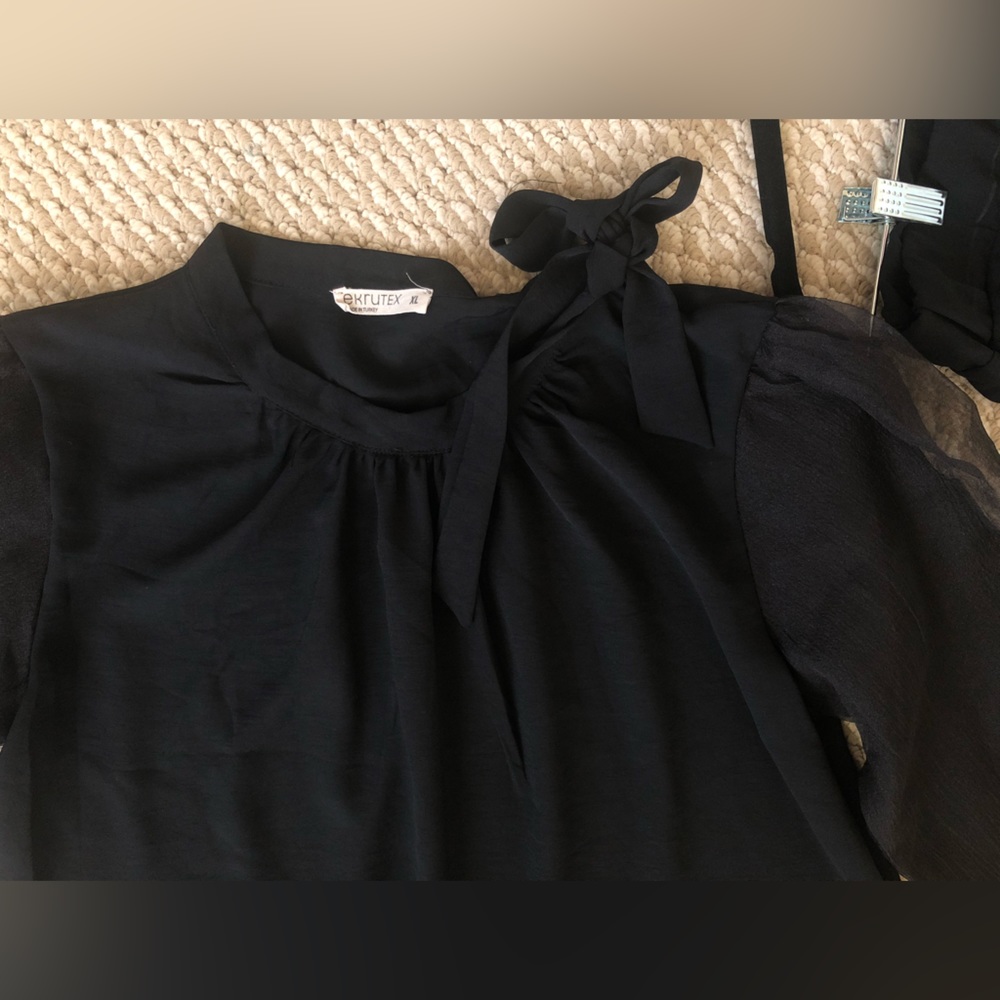 Black shirt and maxi skirt suit